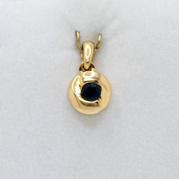 Dije de Oro 18k y Zafiro 0.35 ct